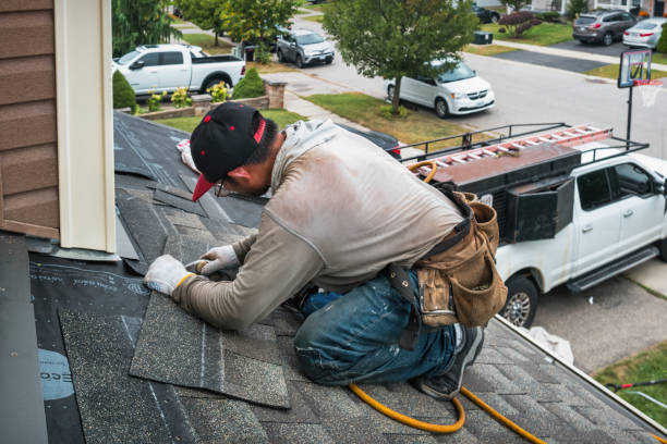Professional Flat Roof Repair technician working in Fancher, NY